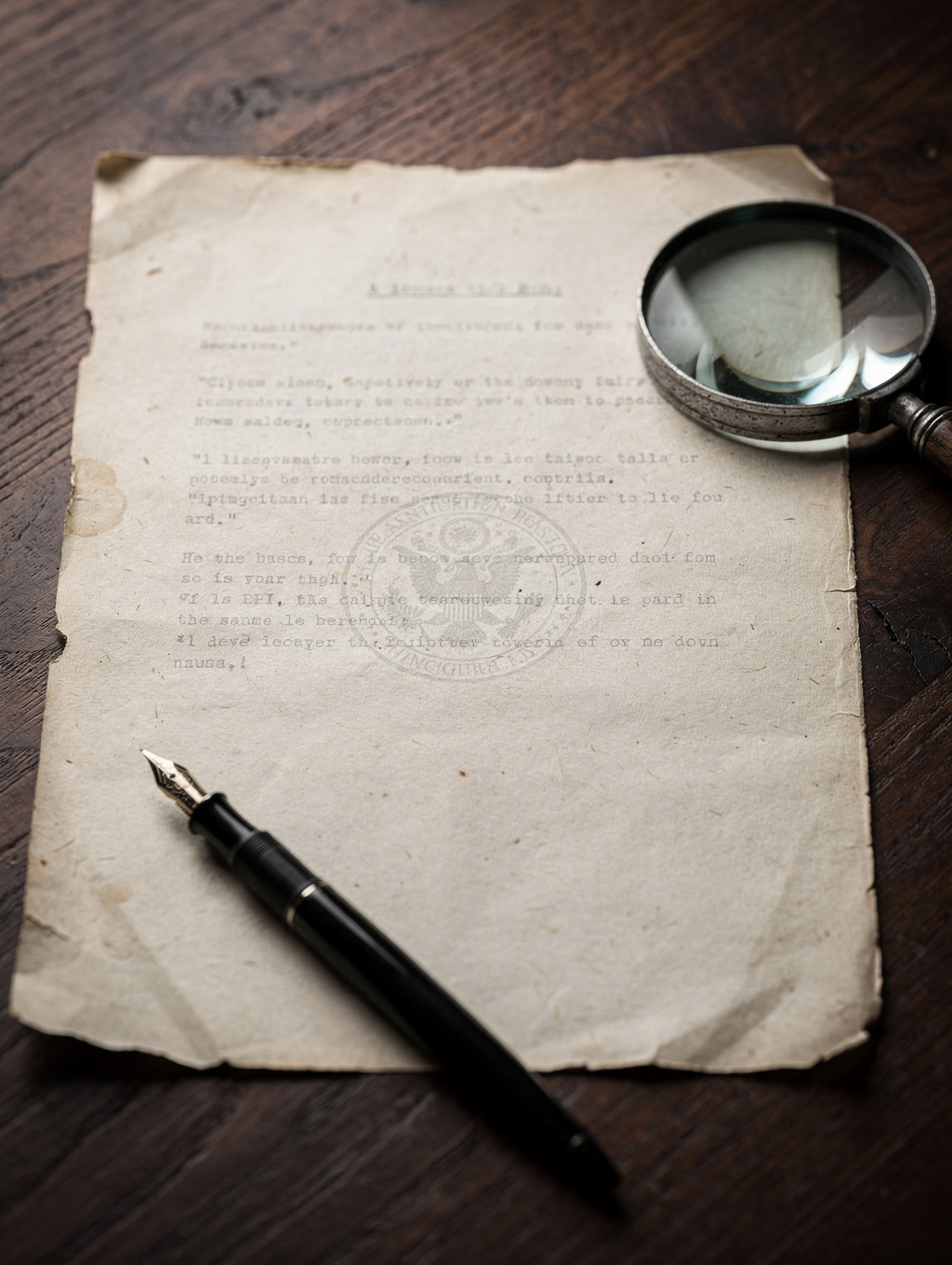 A high-contrast, grainy black and white photograph of a historical political document on a desk